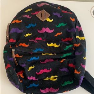 black colorful mustache backpack